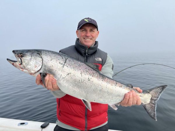 A caught fish on a boat